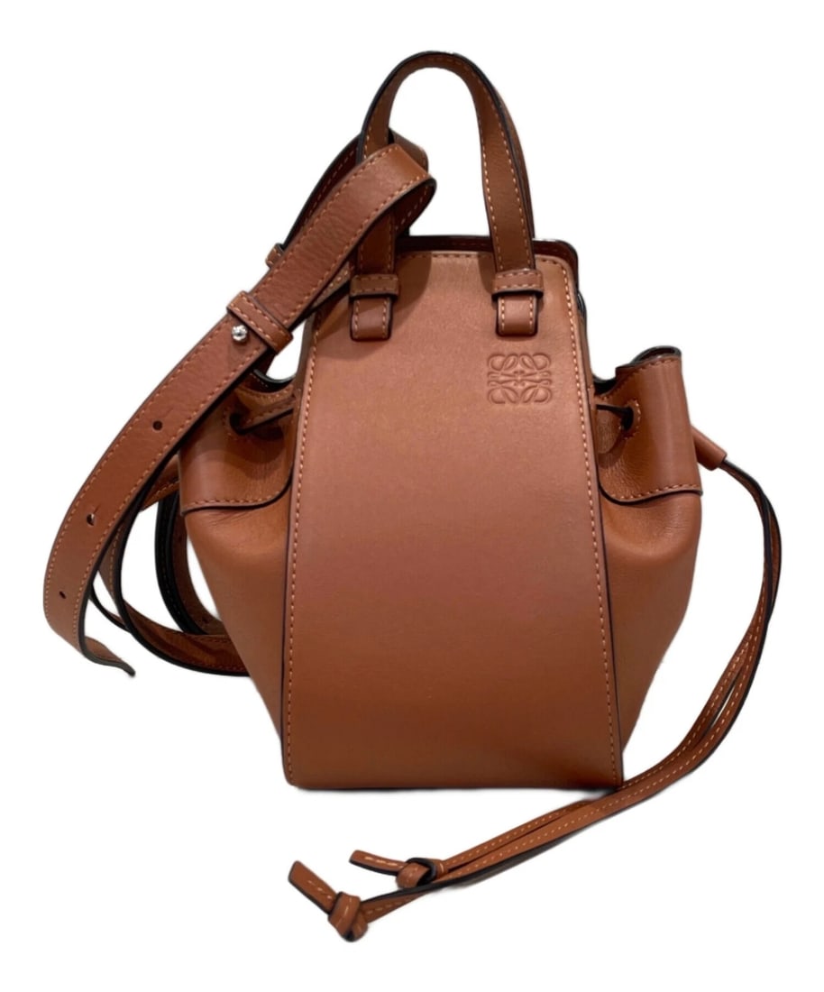 LOEWE HAMMOCK DRAWSTRING MINI BAG: LOEWE Hammock Drawstring Mini Bag Brand: LOEWE Type: Handbag Material: Calf Leather Color: Brown Size: H:20.0cm / W:16.0cm / D:10.5cm Accessories: None Accessories Notice: When purchasing