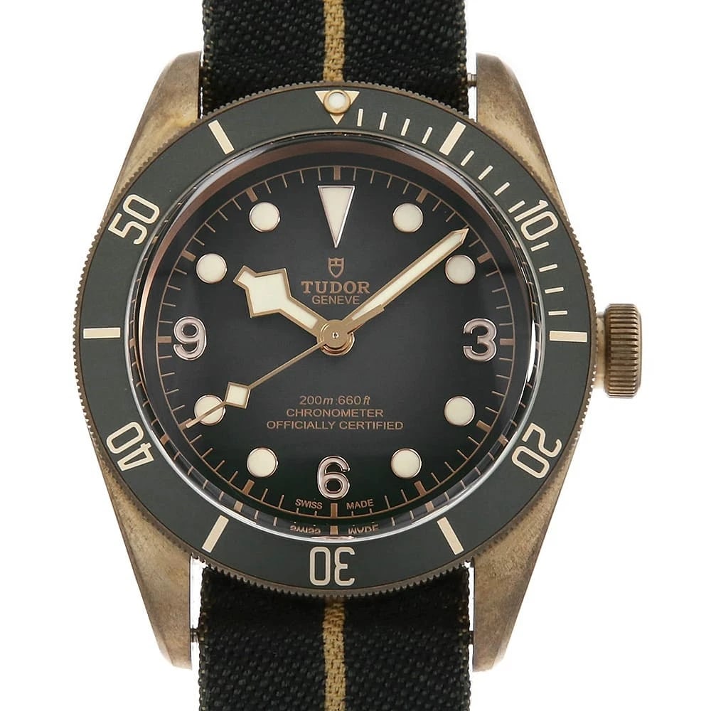 TUDOR BLACK BAY BRONZE WATCH: TUDOR Black bay bronze Watch Brand: TUDOR Type: Wrist watch Material: Band Material fabric, Case Material Bronze Color: Dial Color Black Size: Band Size none, Case Size Case:W43mm Accessories: No