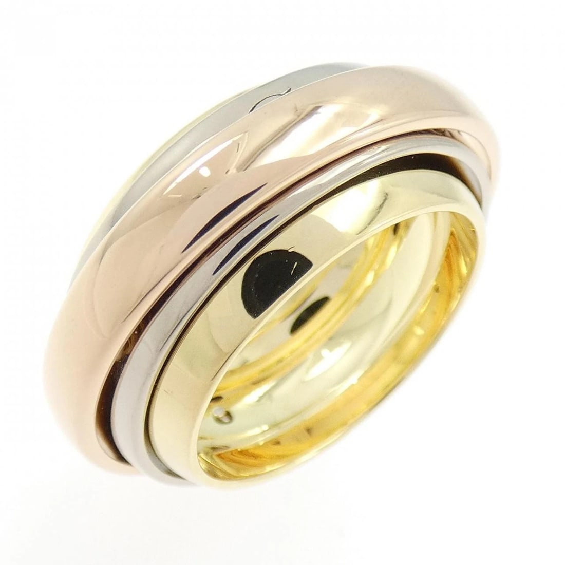 CARTIER TRINITY MUST ESSENCE XMAS LIMITED RING: Cartier Trinity Must Essence Xmas Limited Ring Brand: Cartier Type: Ring Material: 750 Yellow Gold 750 White Gold 750 Pink Gold Color: Yellow Gold White Gold Pink Gold Size: 4.5-5 (US size) 