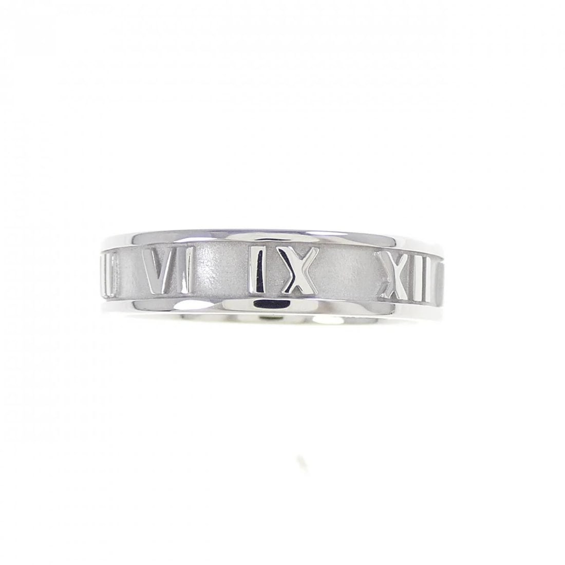 TIFFANY & CO. ATLAS RING: Tiffany & Co. Atlas Ring Brand: Tiffany Type: Ring Material: 750 White Gold Color: White Gold Size: 5 (US size) Accessories: None Accessories Notice: When purchasing pre-owned goods, please