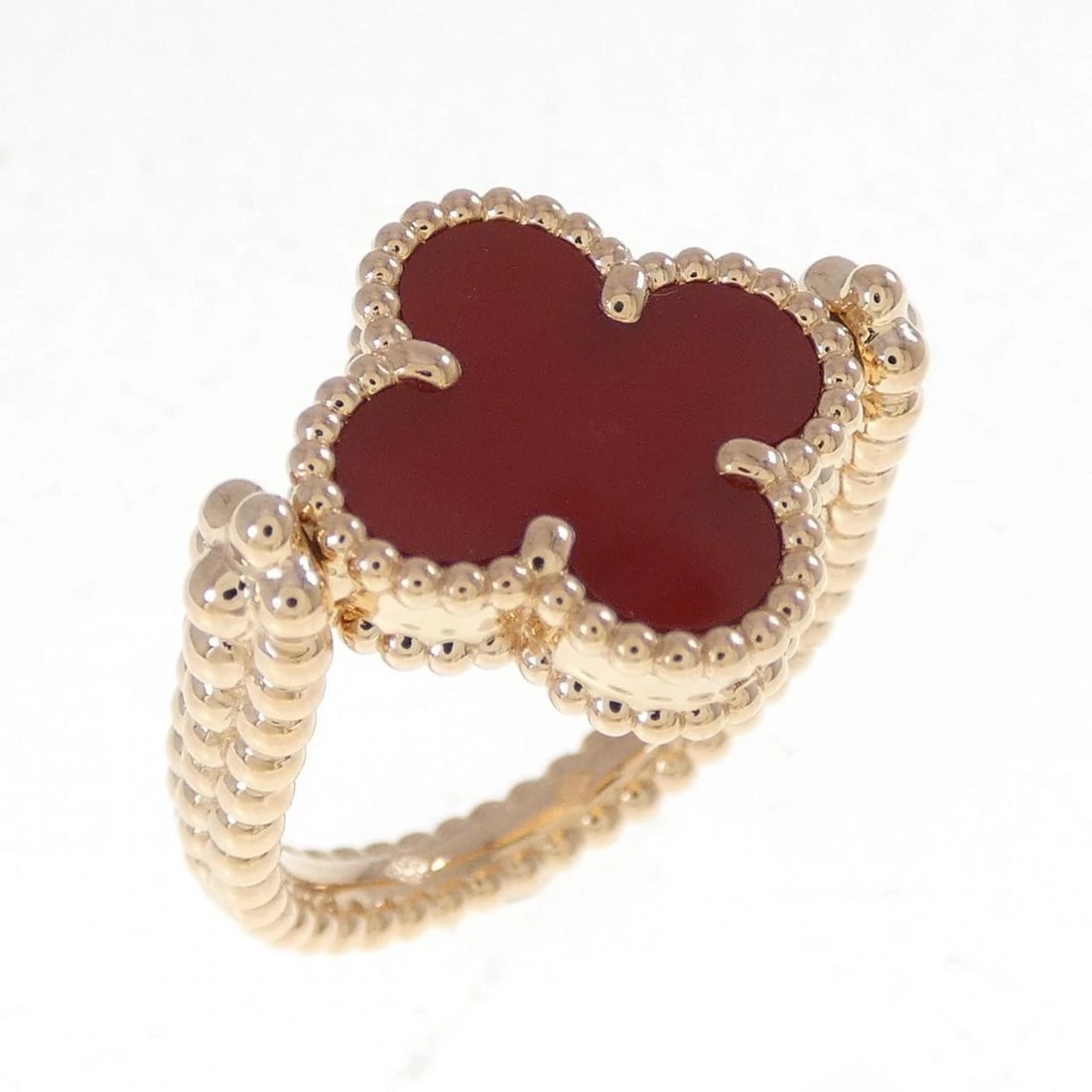 VAN CLEEF & ARPELS ALHAMBRA REVERSIBLE RING: Van Cleef & Arpels Alhambra Reversible Ring Brand: Van Cleef & Arpels Type: Ring Material: 750 Pink Gold Main Stone Carnelian Color: Pink Gold Size: 6 (US size) Accessories: None Accessories