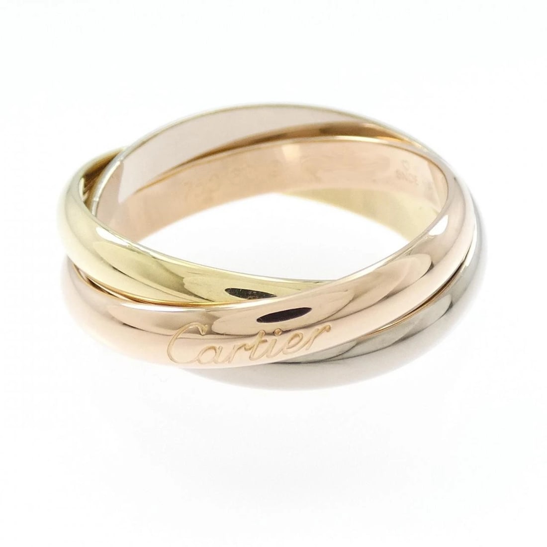 CARTIER TRINITY RING: Cartier Trinity Ring Brand: Cartier Type: Ring Material: 750 Yellow Gold 750 White Gold 750 Pink Gold Color: Yellow Gold White Gold Pink Gold Size: 9.5 (US size) Accessories: None Accessor