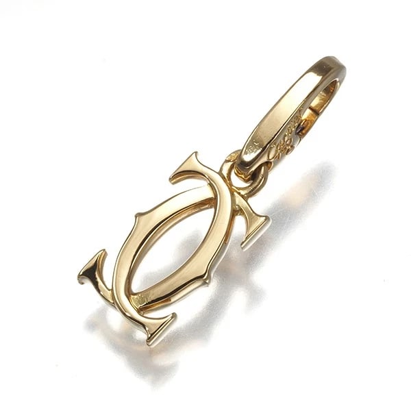 CARTIER PENDANT DOUBLE CHARM: Cartier Pendant Double Charm Brand: Cartier Type: Pendant Material: 18K / 750 / Yellow Gold Color: Yellow Gold Size: Design size: 13.4 x 7.4mm Accessories: None Accessories Notice: When pu