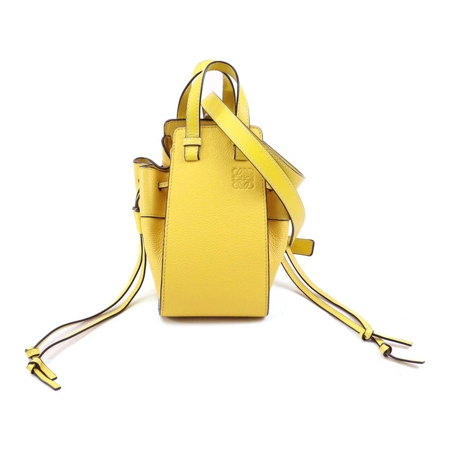 LOEWE HAMMOCK MINI CROSSBODY SHOULDER BAG HANDBAG: LOEWE Hammock Mini Crossbody Shoulder Bag Handbag Brand: LOEWE Type: Crossbody Shoulder Bag Material: Leather Color: Yellow Size: Size [inch] W:6.1inx H:5.5inx D:4.1in Handle drop:2.4in