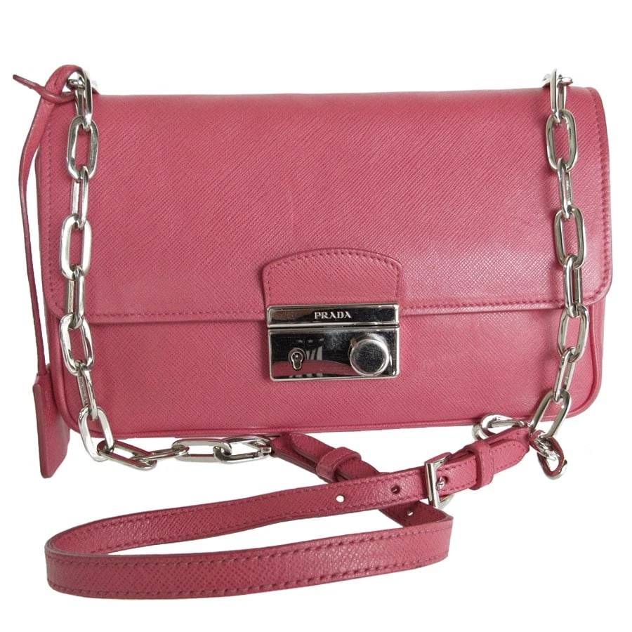 PRADA SHOULDER BAG PINK LEATHER: PRADA Shoulder Bag pink leather Brand: PRADA Type: Shoulder Bag Material: Leather Color: Pink Size: Size [inch] W:9.4inx H:5.9inx D:2.0in Shoulder Length:?Max? 39.4in Accessories: None Acc