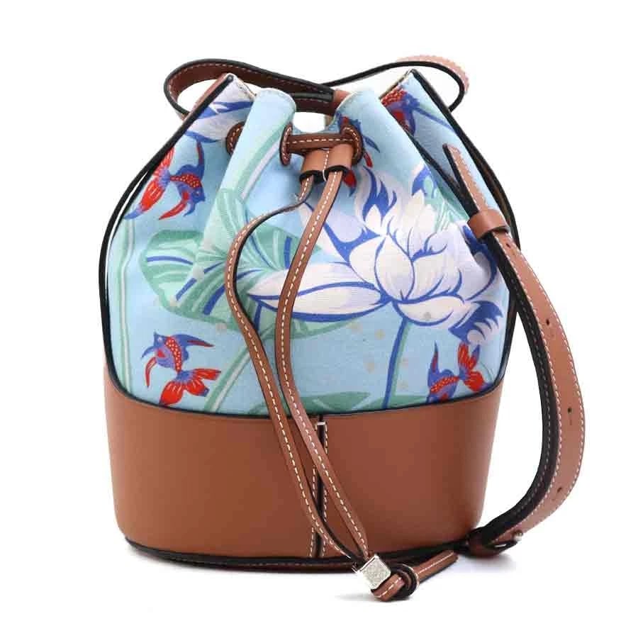 LOEWE IBIZA SHOULDER BAG BLUE/BROWN CANVAS/LEATHER: LOEWE Ibiza Shoulder Bag Blue/Brown Canvas/Leather Brand: LOEWE Type: Shoulder Bag Material: Canvas/Leather Color: Blue / Brown Size: Size [inch] W:6.9inx H:9.1inx D:5.1in Shoulder drop:18.9 ~ 22.