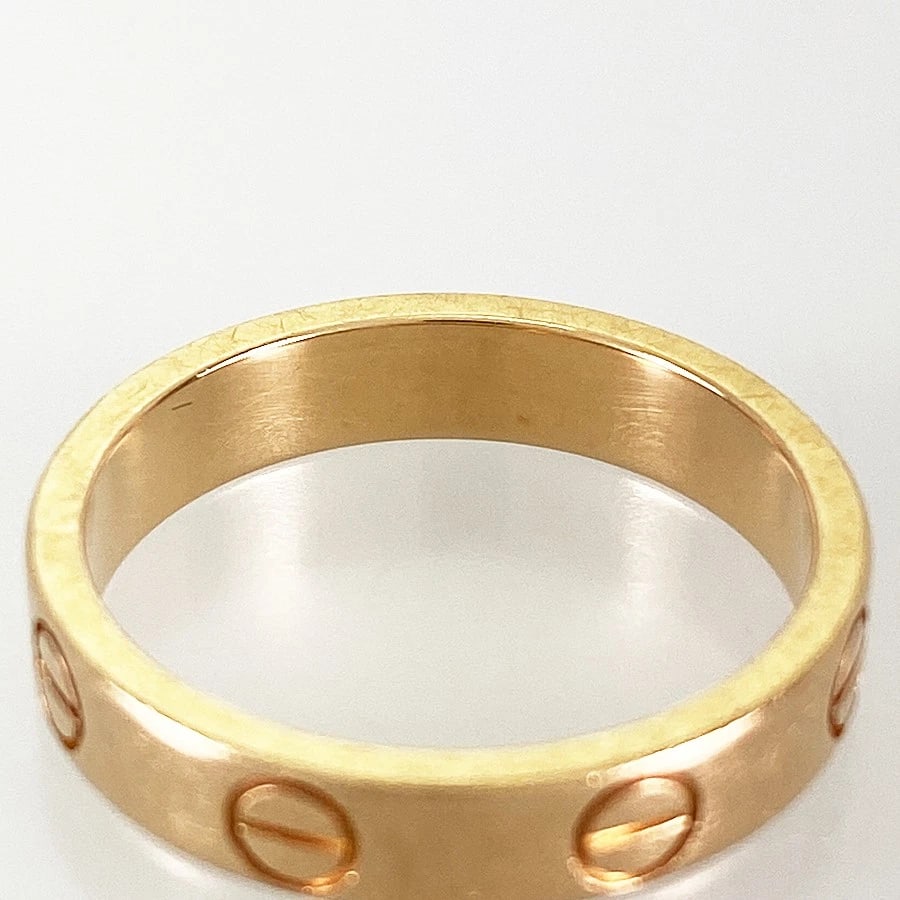 CARTIER MINI LOVE ROSE GOLD RING: Cartier Mini Love Rose gold Ring Brand: Cartier Type: Ring Material: 18K Rose Gold Color: Gold Size: US:5 Accessories: None Accessories Notice: When purchasing pre-owned goods, please refe