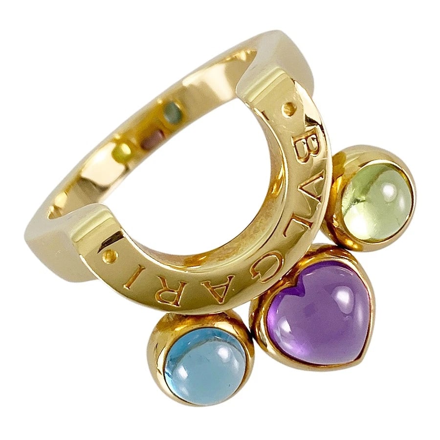 BVLGARI ALLEGRA YELLOW GOLD AMETHYST PERIDOT BLUE TOPAZ RING: BVLGARI Allegra Yellow gold Amethyst Peridot Blue Topaz Ring Brand: BVLGARI Type: Ring Material: 18K Yellow Gold Color: Gold Size: US:5.5 Accessories: None Accessories Notice: When purchasing