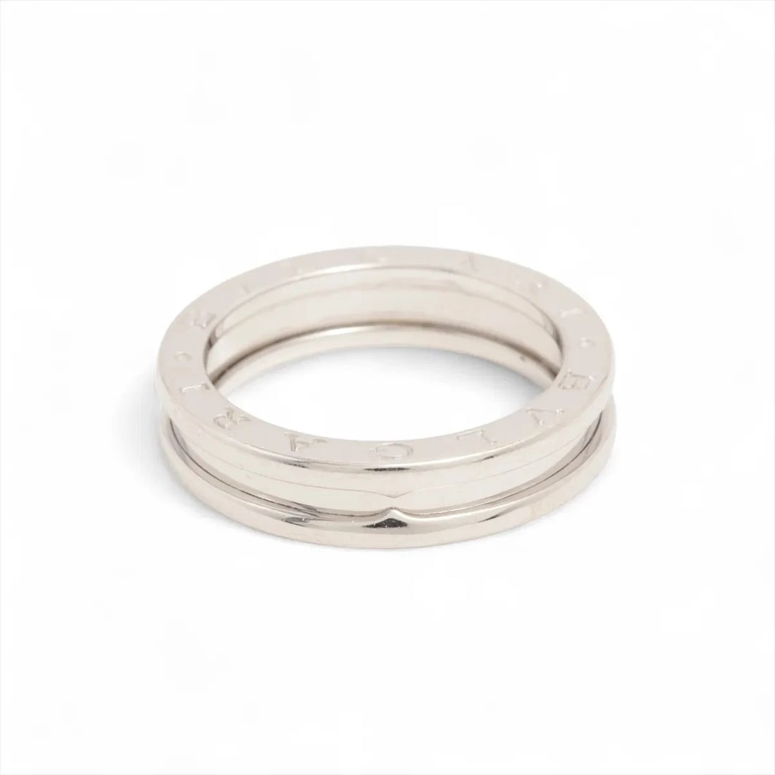 BVLGARI B.ZERO 1 RING 750(WG): Bvlgari B.Zero 1 Ring 750(WG) Brand: Bvlgari Type: Ring Material: none Color: 750(WG) Size: 8 - 8.25 Accessories: None Accessories Notice: When purchasing pre-owned goods, please refer to