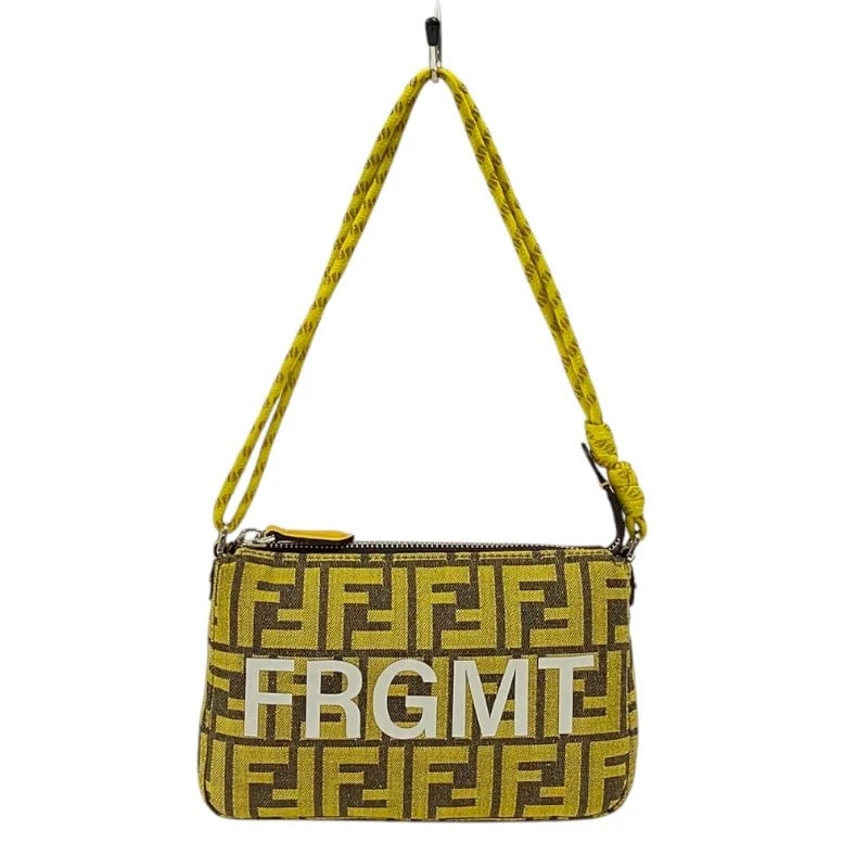 FENDI BAGUETTE SLIM CLUTCH FRGMT SHOULDER BAG: FENDI Baguette Slim Clutch FRGMT Shoulder Bag Brand: FENDI Type: Shoulder Bag Material: Jacquard Color: yellow Size: W7.5 x H4.7x D1.2inch Shoulder:17.7inch Accessories: None Accessories N