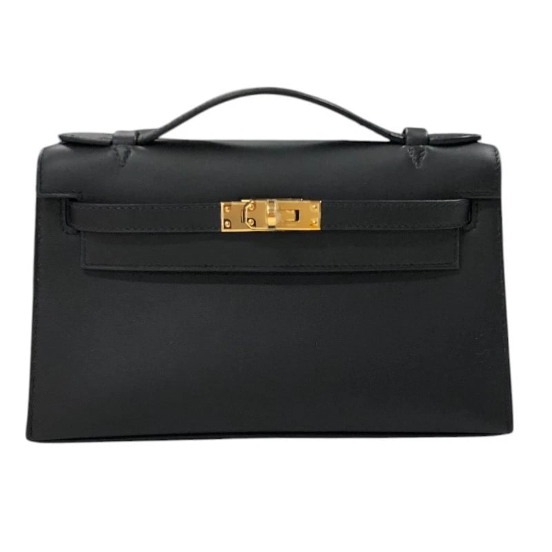 HERMES POCHETTE KELLY HANDBAG: HERMES Pochette Kelly Handbag Brand: HERMES Type: Handbag Material: Swift Color: Black Gold Hardware Size: W8.5 x H4.9x D2.4inch Accessories: None Accessories Notice: When purchasing pre-o