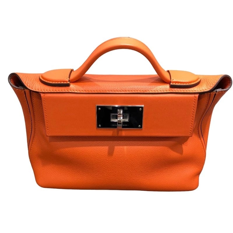 HERMES VAN CATTLE MINI HANDBAG: HERMES van cattle mini Handbag Brand: HERMES Type: Handbag Material: Evercolor Color: Orange Minyan SilverHardware Size: W9.4 x H8.3x D3.9inch Accessories: None Accessories Notice: When pu
