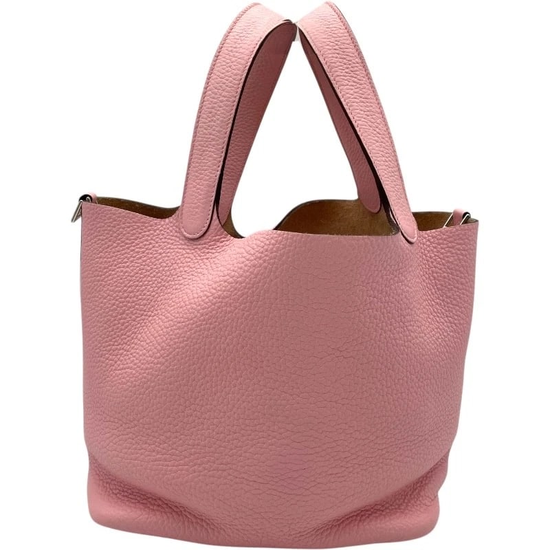 HERMES PICO TAN LOCK MM HANDBAG: HERMES Pico Tan Lock MM Handbag Brand: HERMES Type: Handbag Material: Taurillon Clemence Color: Rose Sakura SVHardware Size: W8.5 x H8.3x D6.9inch Accessories: None Accessories Notice: When