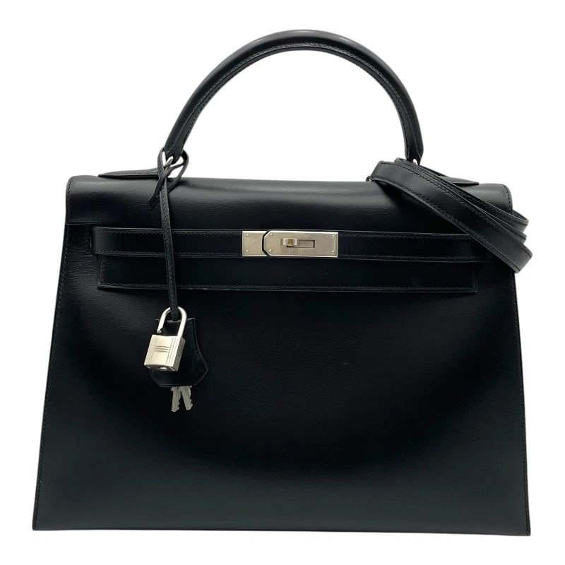 HERMES KELLY 32 OUTSIDE SEWING HANDBAG: HERMES Kelly 32 outside sewing Handbag Brand: HERMES Type: Handbag Material: Box scarf Color: Black SilverHardware Size: W12.8 x H8.7x D4.5inch Shoulder:31.9inch Accessories: None Accessor