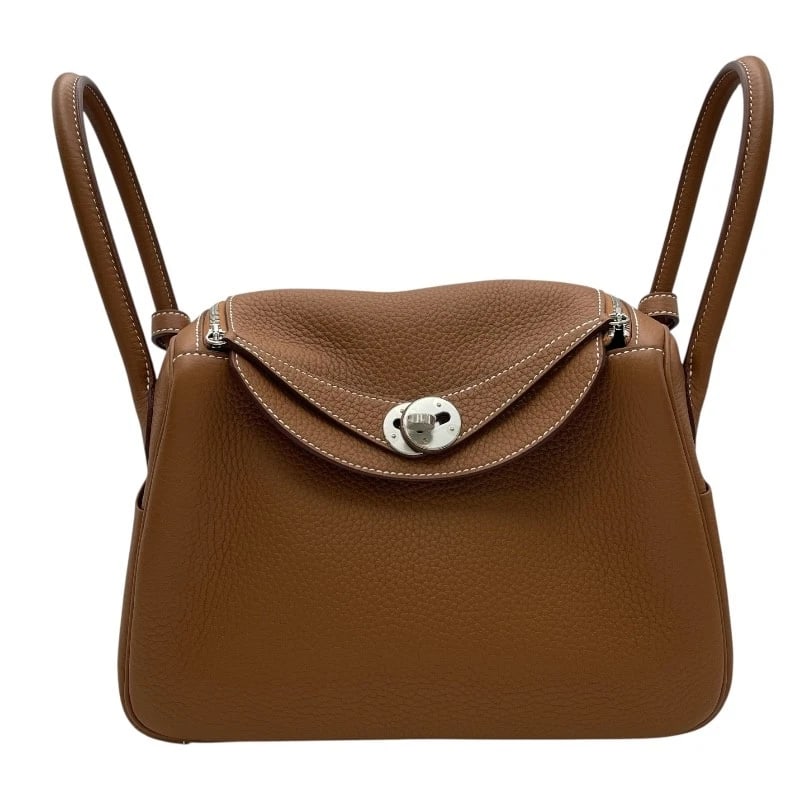 HERMES LINDY 26 SHOULDER BAG: HERMES Lindy 26 Shoulder Bag Brand: HERMES Type: Shoulder Bag Material: Taurillon Clemence Color: Gold SV Hardware Size: W10.2 x H6.7x D5.1inch Shoulder:16.5inch Accessories: None Accessories