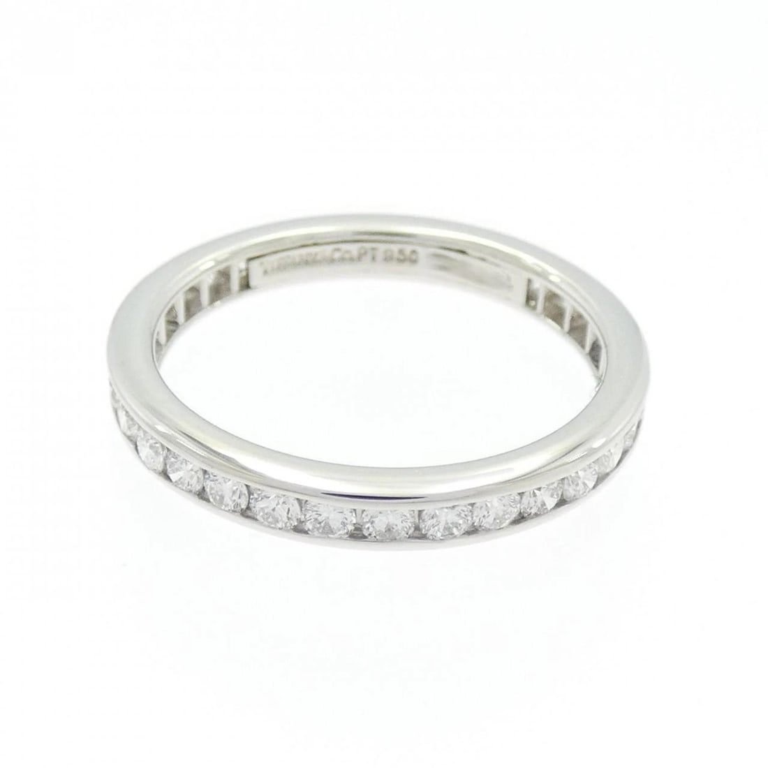 TIFFANY & CO. FULL CIRCLE CHANNEL SETTING RING: Tiffany & Co. Full Circle channel setting Ring Brand: Tiffany Type: Ring Material: Platinum 950 Main Stone Natural Color: Platinum Size: 5 (US size) Accessories: None Accessories Notice: W