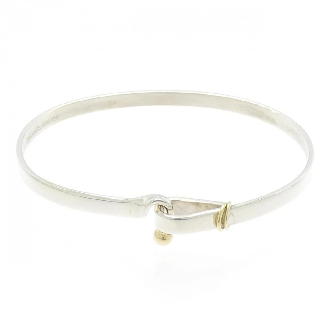TIFFANY & CO. HOOK & EYE BANGLE: Tiffany & Co. Hook & eye Bangle Brand: Tiffany Type: Bracelet Material: 925 Silver 750 Yellow Gold Color: Silver Yellow Gold Size: 17.5cm Accessories: None Accessories Notice: When purchas