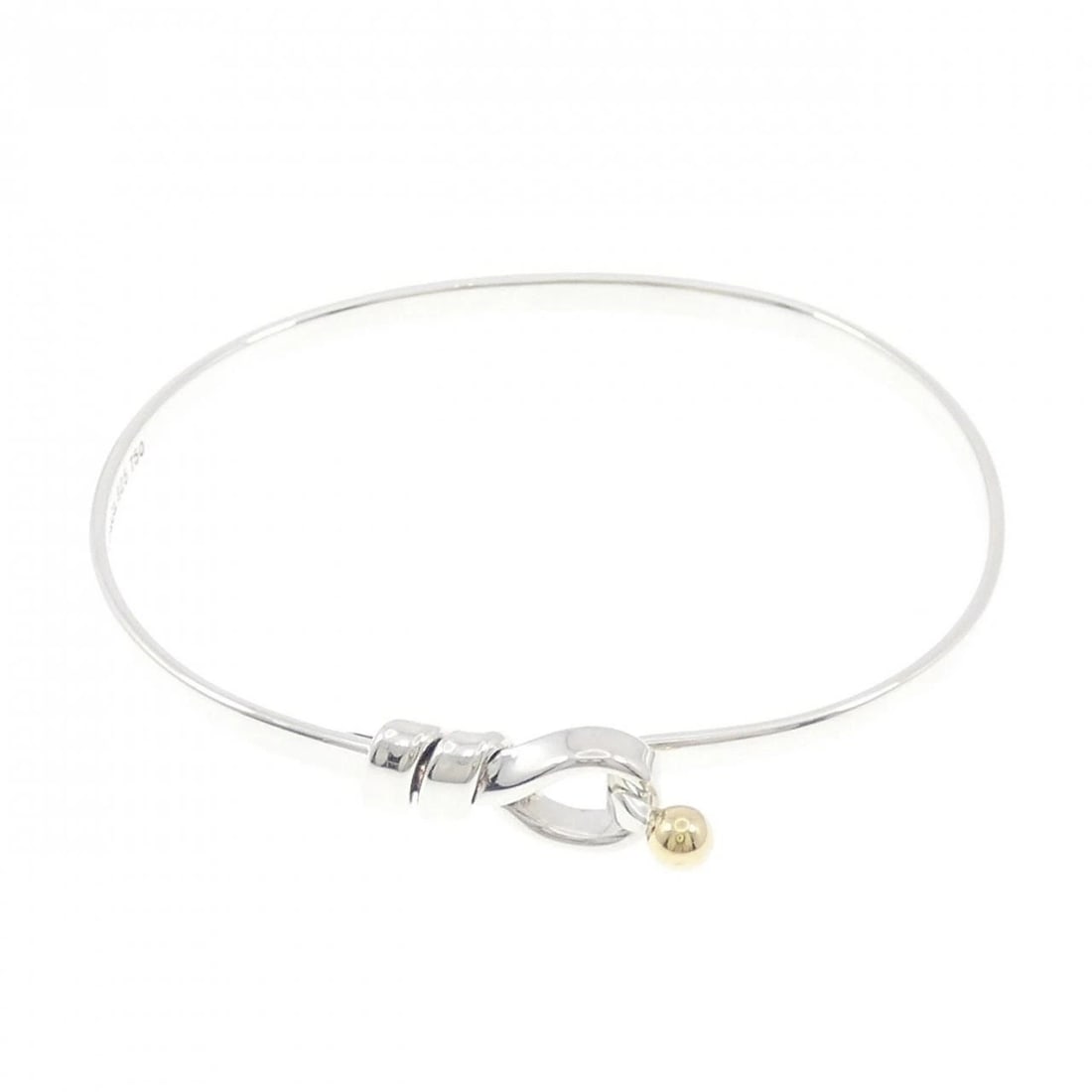 TIFFANY & CO. HOOK & EYE BANGLE: Tiffany & Co. Hook & eye Bangle Brand: Tiffany Type: Bracelet Material: 925 Silver 750 Yellow Gold Color: Silver Yellow Gold Size: 17cm Accessories: None Accessories Notice: When purchasin