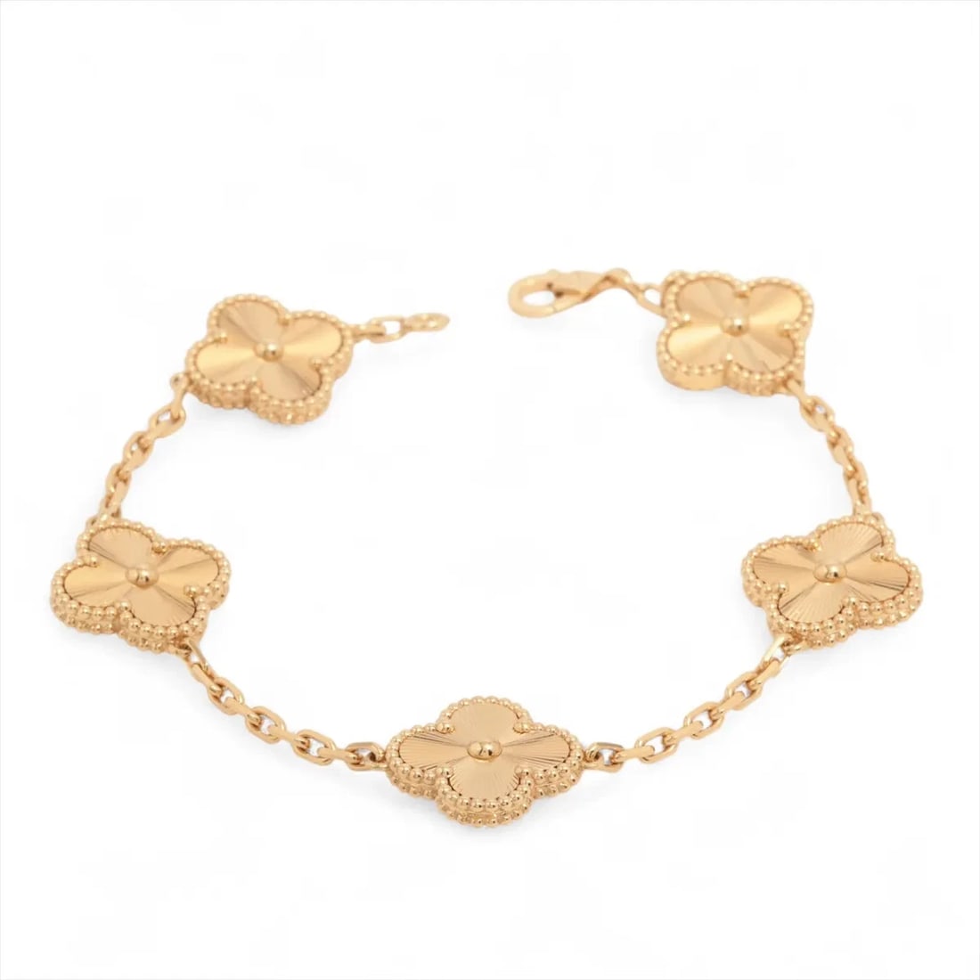 VAN CLEEF & ARPELS VINTAGE ALHAMBRA GUILLOCHE 5P BRACELET: Van Cleef & Arpels Vintage Alhambra Guilloche 5P Bracelet Brand: Van Cleef & Arpels Type: Bracelet Material: none Color: 750(YG) Size: Bracelet length:19.3 Accessories: None Accessories No
