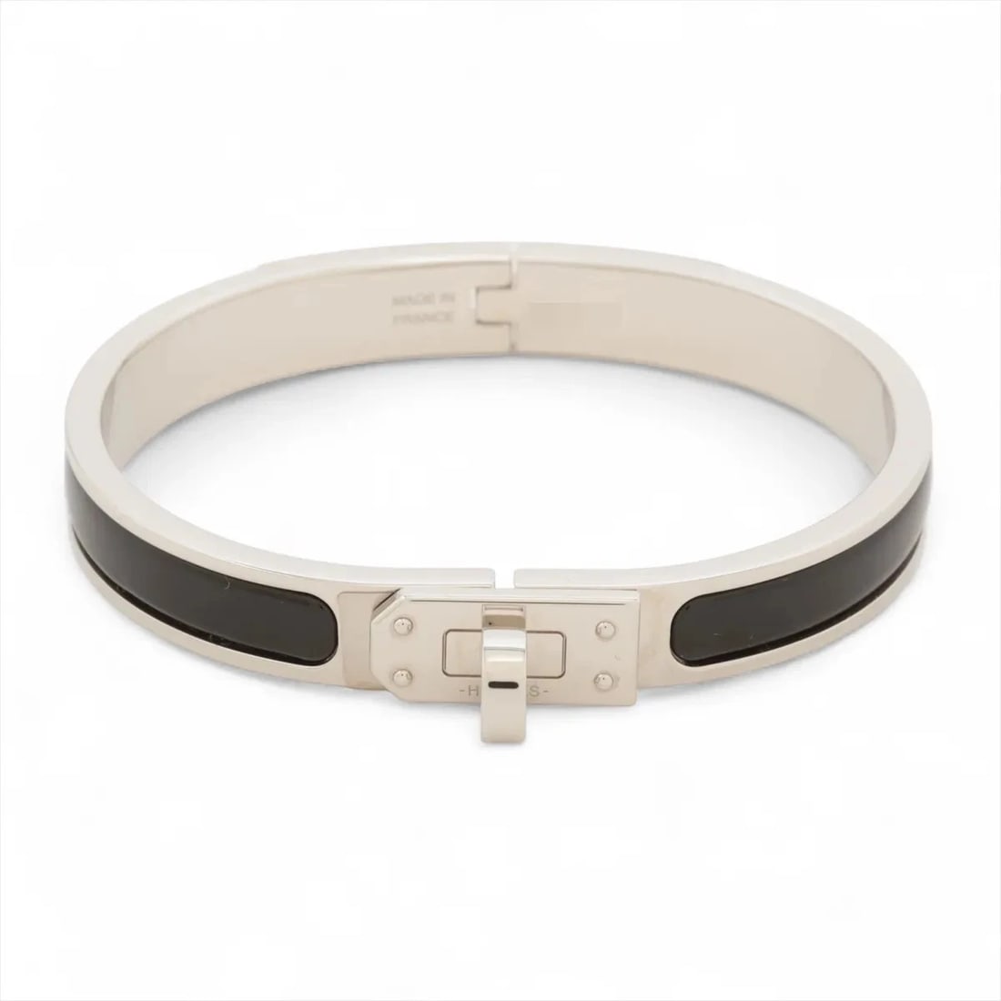 HERMÈS MINICLICK KELLY BRACELET ENAMEL X METAL BLACK × SILVER: Hermès Miniclick Kelly Bracelet Enamel x metal Black × Silver Brand: Hermès Type: Bracelet Material: Black × Silver Color: Enamel x metal Size: Bracelet length:16 Accessories: None Accesso