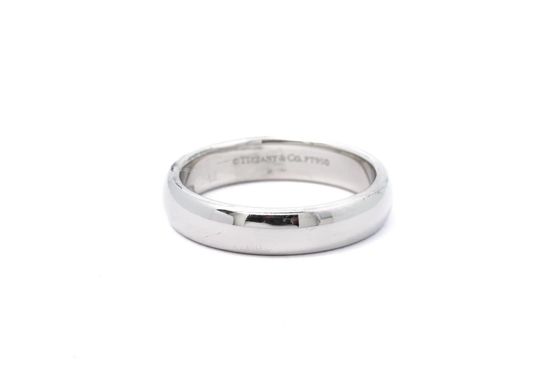 TIFFANY & CO PLATINUM 950 WEDDING BAND RING: Tiffany & Co Platinum 950 Wedding Band Ring Brand: Tiffany & Co Type: Ring Material: White Color: Platinum 950 Size: 8 US Accessories: None Accessories Notice: When purchasing pre-owned go
