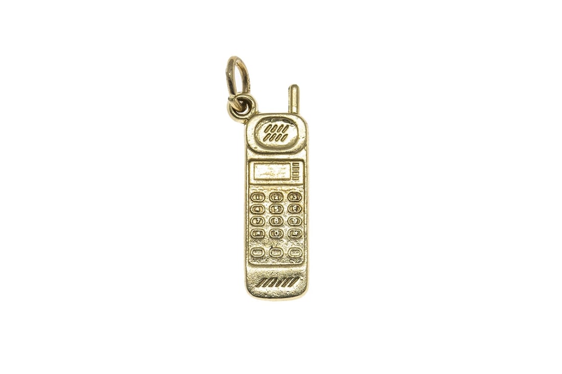 REMBRANDT CHARMS PHONE CHARM 14K YELLOW GOLD PENDANT: Rembrandt Charms Phone Charm 14K Yellow Gold Pendant Brand: Rembrandt Charms Type: Charm(s) Material: Yellow Color: Yellow Gold 14k Size: Length x Width - 1" x 0.3" Accessories: None