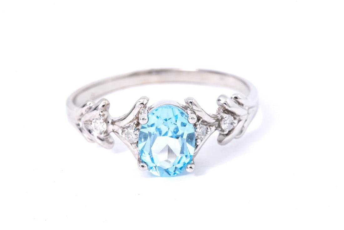 SOLID 14KT WHITE GOLD PRONG-SET BLUE TOPAZ RING (1 of 4)