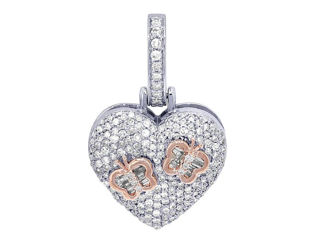 PAVE SET REAL DIAMOND HEART SHAPED PENDANT WITH BAGUETTE: Pave Set Real Diamond Heart Shaped Pendant with Baguette Brand: None Type: Pendant Material: Metal White Gold Main Stone Natural Color: White Gold Size: Dimension L - 1", W - 0.65" Accessories: N