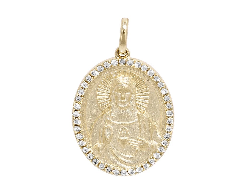 UNISEX OVAL SACRED HEART OF JESUS REAL DIAMOND PENDANT: Unisex Oval Sacred Heart Of Jesus Real Diamond Pendant Brand: None Type: Pendant Material: Metal Yellow Gold Main Stone Natural Color: Yellow Gold Size: Dimension L 1" x W 15mm Accessories: None