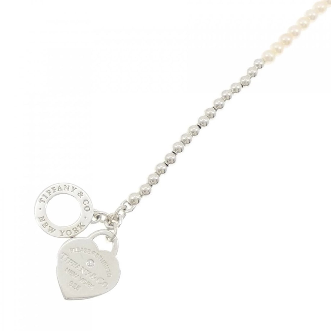 TIFFANY WRAP BRACELET: Tiffany wrap Bracelet Brand: Tiffany Type: Bracelet Material: 925 Silver Main Stone Freshwater Pearl Color: Silver Size: 16cm ActualSize Max W: 24.7mm Accessories: None Accessories Notice: