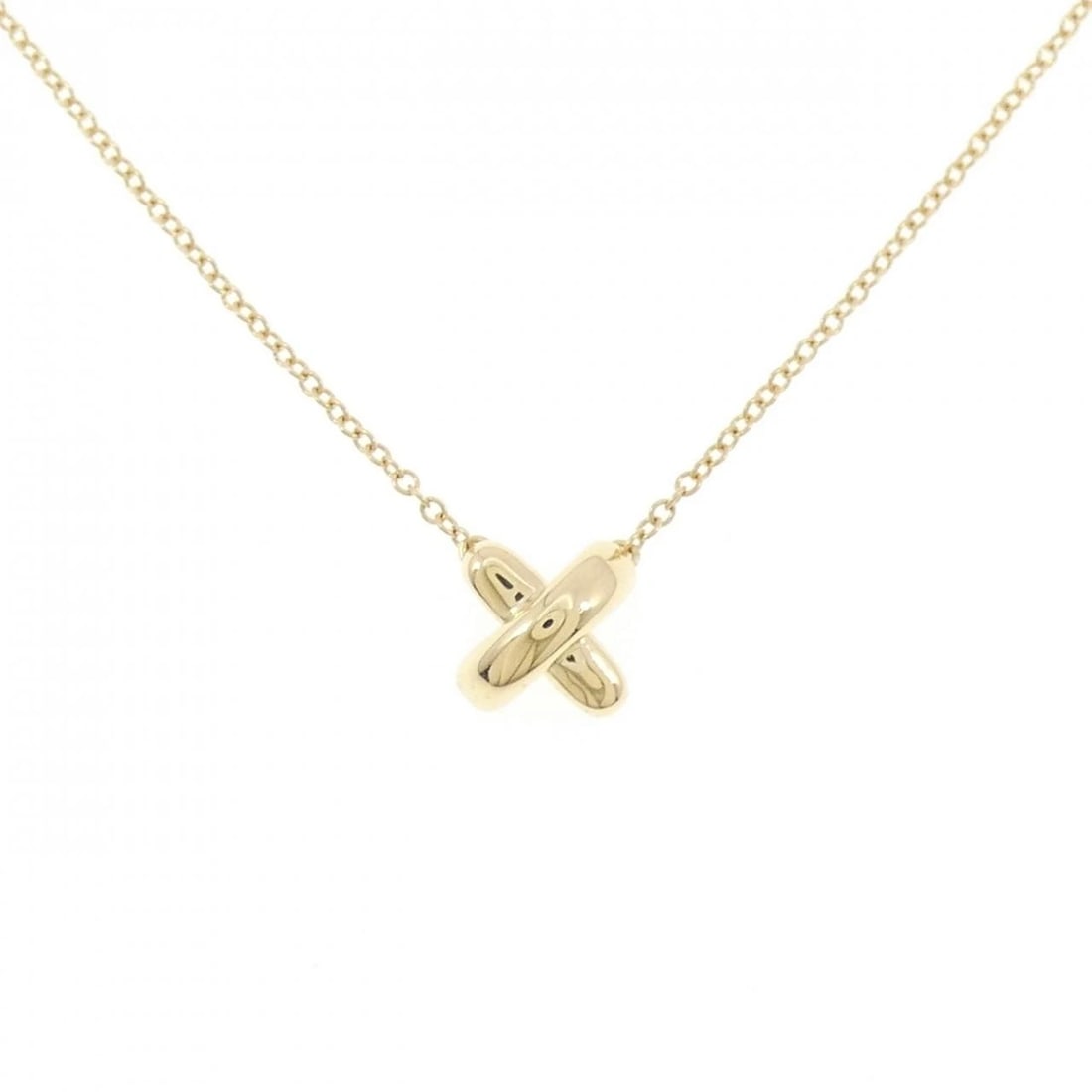 TIFFANY & CO. CROSS STITCH NECKLACE: Tiffany & Co. Cross Stitch Necklace Brand: Tiffany Type: Necklace Material: 750 Yellow Gold Color: Yellow Gold Size: 42cm ActualSize Pendant top H x W: 7.2mmx7.2mm Chain Max. W: 1.1mm 