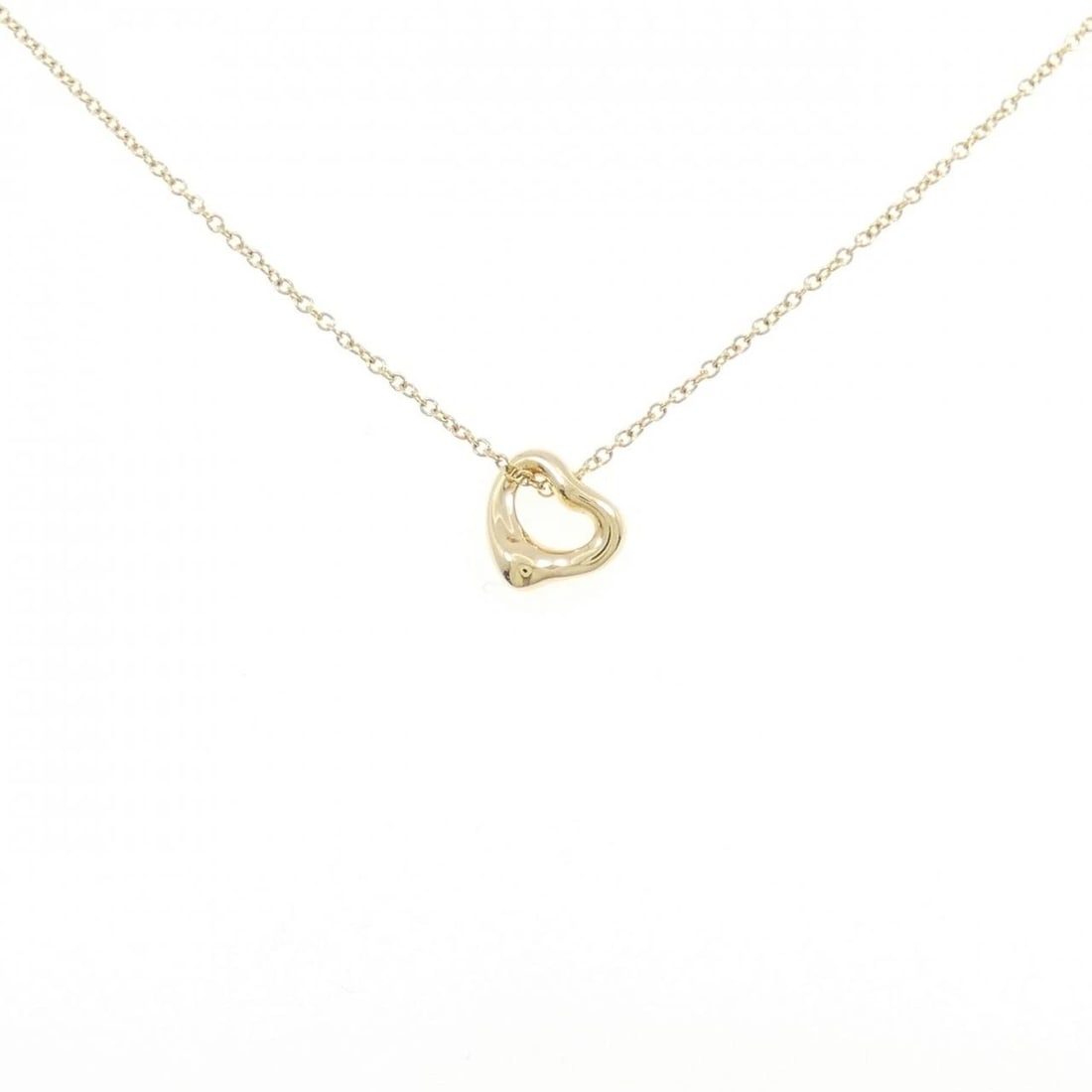TIFFANY & CO. OPEN HEART NECKLACE: Tiffany & Co. Open Heart Necklace Brand: Tiffany Type: Necklace Material: 750 Yellow Gold Color: Yellow Gold Size: 41cm ActualSize Pendant top H x W: 7.0mmx7.0mm Chain Max. W: 0.8mm 