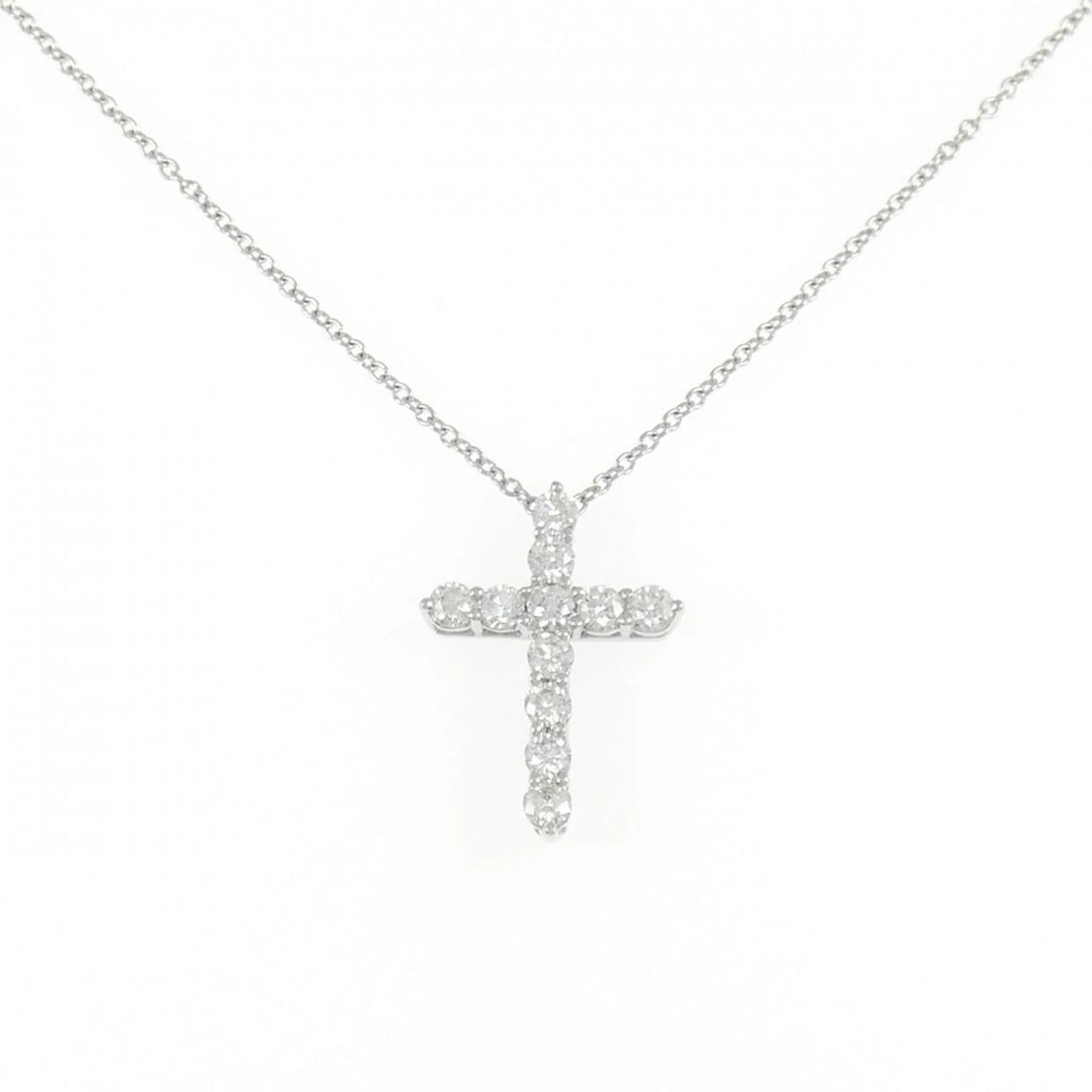 TIFFANY & CO. SMALL CROSS NECKLACE: Tiffany & Co. Small Cross Necklace Brand: Tiffany Type: Necklace Material: Platinum 950 Main Stone Natural Color: Platinum Size: 41cm ActualSize Pendant top H x W: 17.6mmx12.7mm Chain Max. W: