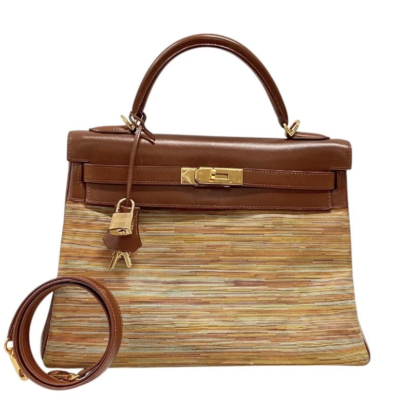 HERMES KELLY 32 INNER STITCH VIBRATO HANDBAG: HERMES Kelly 32 Inner Stitch Vibrato Handbag Brand: HERMES Type: Handbag Material: Box scarf Color: Brown Gold Hardware Size: W12.6 x H8.7x D4.7inch Shoulder:35.0inch Accessories: None Acc
