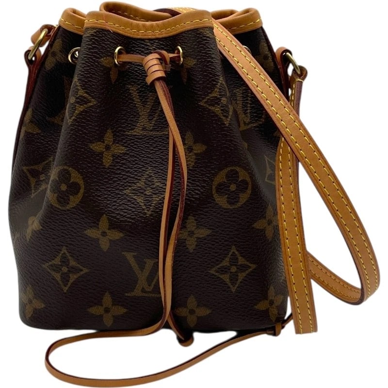 LOUIS VUITTON NANO NOE SHOULDER BAG: LOUIS VUITTON Nano Noe Shoulder Bag Brand: LOUIS VUITTON Type: Shoulder Bag Material: Monogram Color: Brown Size: W7.3 x H6.1x D3.5inch Shoulder:46.3inch Accessories: None Accessories Noti