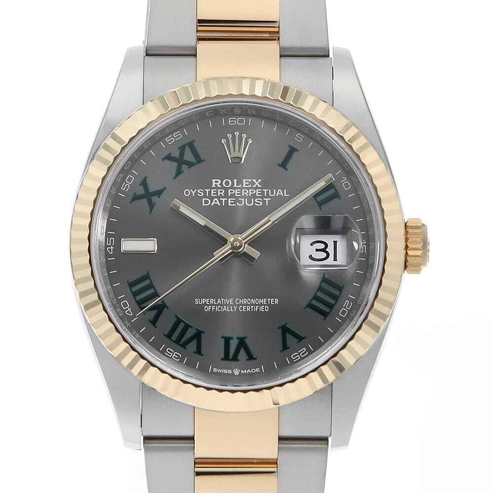 ROLEX DATEJUST SLATE GREEN ROMA OYSTER BRACELET WATCH: ROLEX DATEJUST slate Green Roma Oyster BraceletWatch Brand: ROLEX Type: Wrist watch Material: Band Material Stainless Steel/Yellow Gold, Case Material Stainless Steel Color: Dial Color Slate Size:
