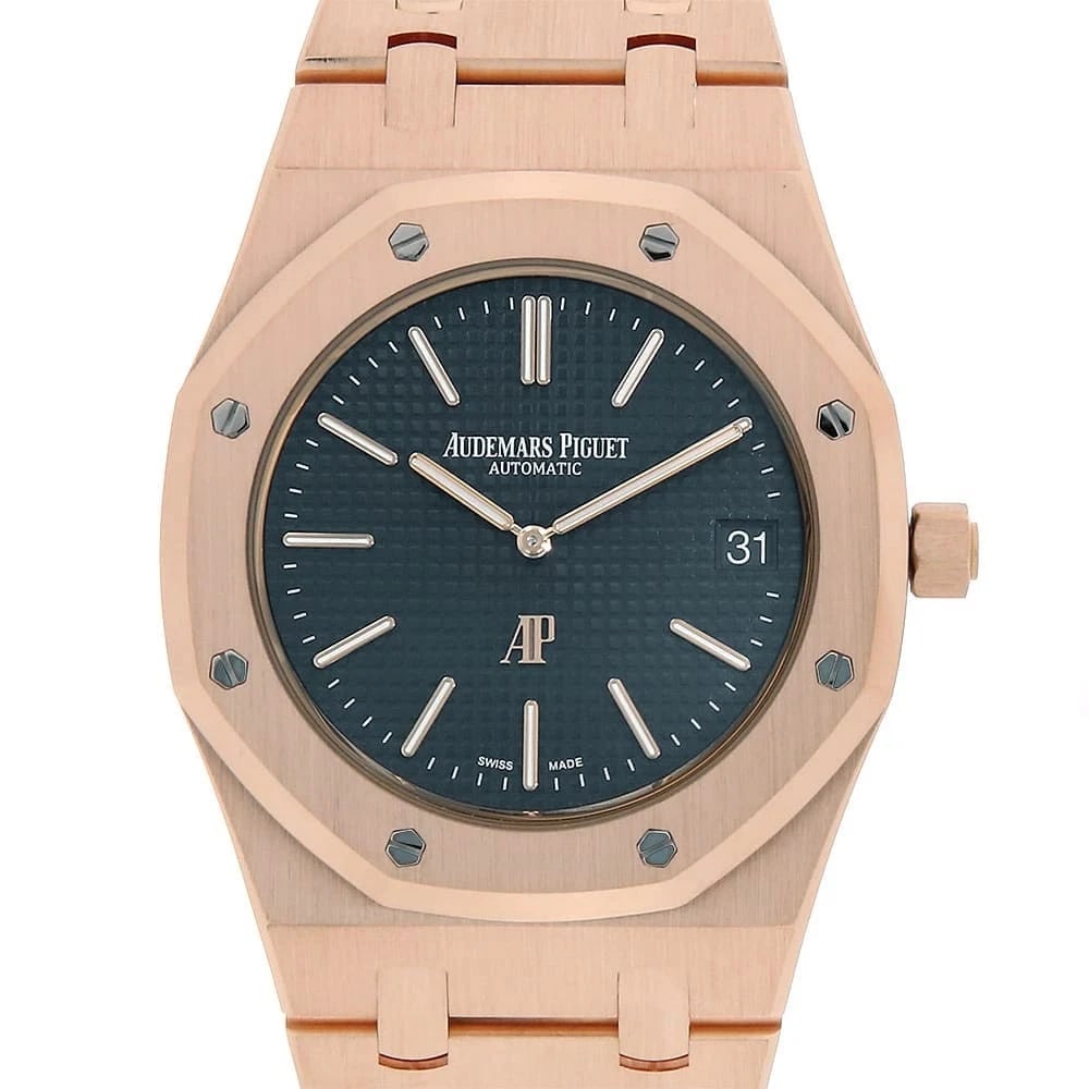 AUDEMARS PIGUET ROYAL OAK EXTRA THIN WATCH: AUDEMARS PIGUET Royal Oak Extra Thin Watch Brand: AUDEMARS PIGUET Type: Wrist watch Material: Band Material Pink Gold, Case Material Pink Gold Color: Dial Color Blue Size: Band Size 17.5cm (6.9inc
