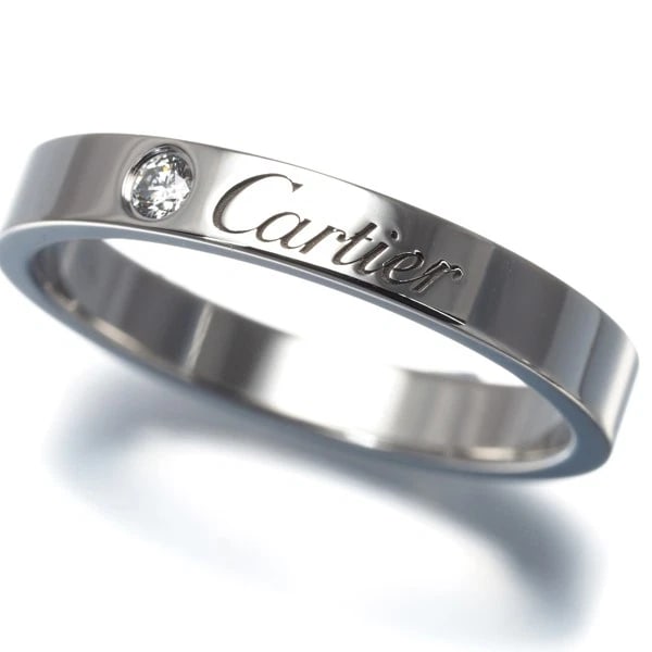 CARTIER RING DIAMOND C DE CARTIER WEDDING BAND: Cartier Ring Diamond C de Cartier Wedding Band Brand: Cartier Type: Ring Material: Metal Platinum Main Stone Natural Color: Platinum Size: US7.25 Accessories: None Accessories Notice: When