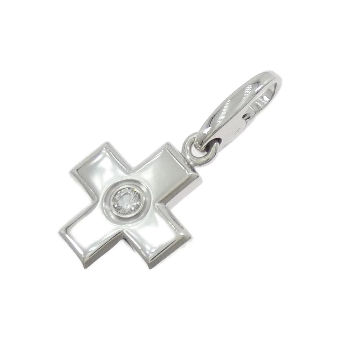 CARTIER CROSS CHARM: Cartier Cross Charm Brand: Cartier Type: Pendant Brooch Material: 750 White Gold Main Stone Natural Color: White Gold Size: HxW: 25.8mmx13.0mm Accessories: None Accessories Notice: When