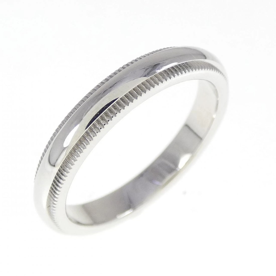 TIFFANY & CO. MILGRAIN RING: Tiffany & Co. Milgrain Ring Brand: Tiffany Type: Ring Material: Platinum 950 Color: Platinum Size: 5.5 (US size) Accessories: None Accessories Notice: When purchasing pre-owned goods, please