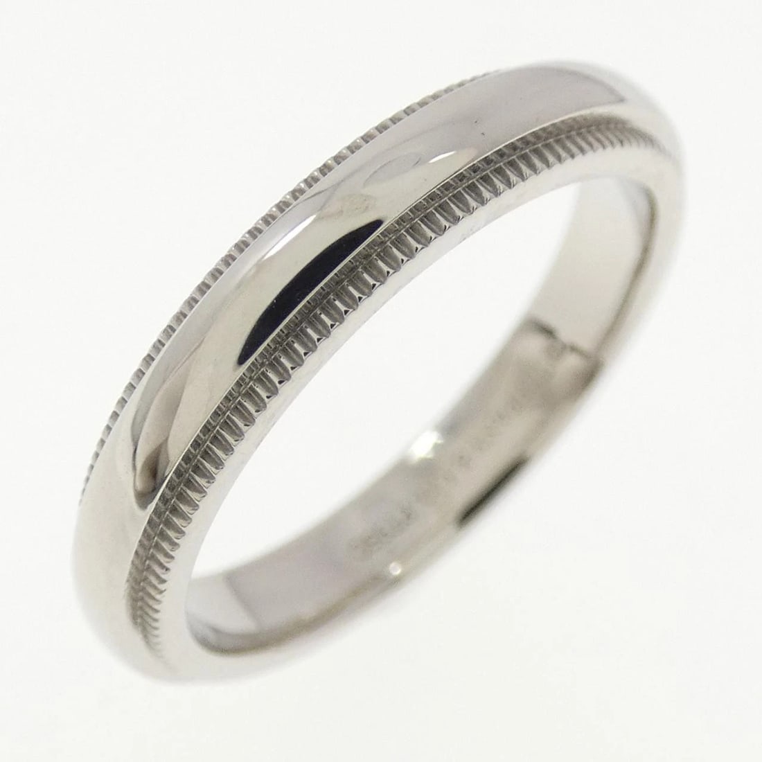 TIFFANY & CO. MILGRAIN RING: Tiffany & Co. Milgrain Ring Brand: Tiffany Type: Ring Material: Platinum 950 Color: Platinum Size: 4.5-5 (US size) Accessories: None Accessories Notice: When purchasing pre-owned goods,