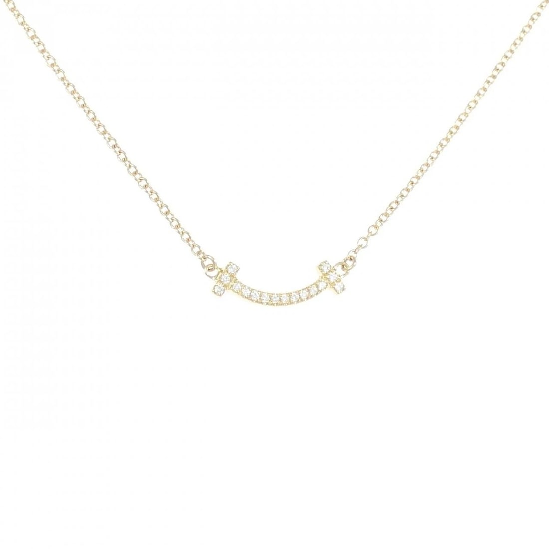 TIFFANY T SMILE MINI NECKLACE: Tiffany T Smile mini Necklace Brand: Tiffany Type: Necklace Material: 750 Yellow Gold Main Stone Natural Color: Yellow Gold Size: 41/46cm Accessories: None Accessories Notice: When purchasing