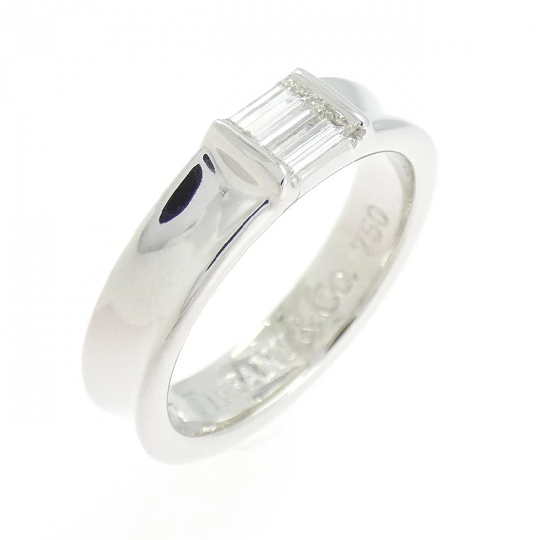 TIFFANY STACKING RING: Tiffany Stacking Ring Brand: Tiffany Type: Ring Material: 750 White Gold Main Stone Natural Color: White Gold Size: 5 (US size) Accessories: None Accessories Notice: When purchasing pre-owned