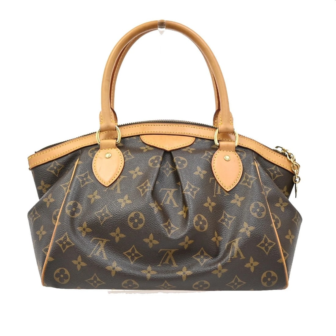 LOUIS VUITTON TIVOLI PM HANDBAG MONOGRAM LEATHER FRANCE BROWN: LOUIS VUITTON Tivoli PM Handbag Monogram Leather France Brown Brand: Louis Vuitton Type: Hand Bag Material: Monogram, Leather Color: Brown Size: W 11.4 x H 8.3 x D 5.1 " (approx.) HANDLE DROP ( in