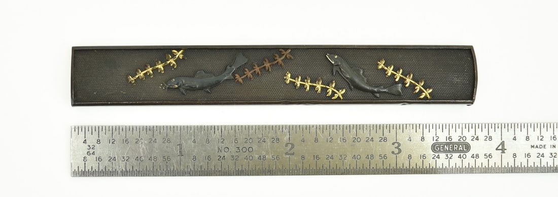 KINKO KODZUKA: Kinko Kodzuka Description: Kinko Kodzuka. Shakudo Nanako ground with Fish and gold Seaweed. Four small dents on edge. Unsigned. Custom box. Size: 9.2 cm (or 92 mm) is approximately 3.62 inches. 