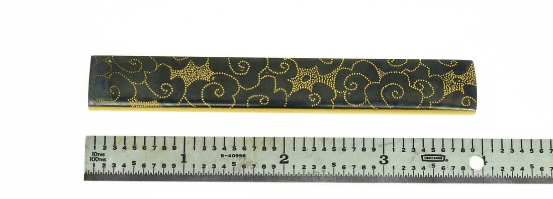 KINKO KODZUKA: Kinko Kodzuka Description: Kinko Kodzuka. Shakudo with scrolling gold dots. Reverse has foliage carving. Unsigned. Size: Length 3. 75 inch Accessories: None Accessories Notice: When purchasing