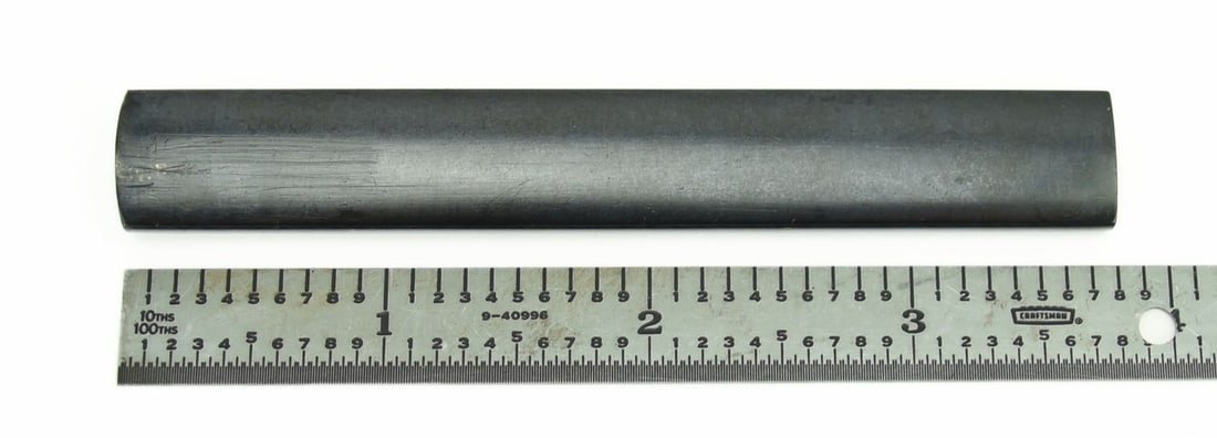 KINKO KODZUKA: Kinko Kodzuka Description: Kinko Kodzuka. Shakudo nanako ground. Decorated with relief gold vase with flower arrangement. Exceptional quality and condition. Comes with N.B.T.H.K. certificate,