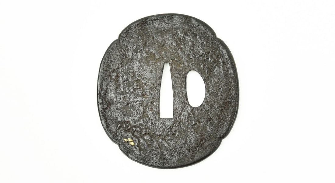 IRON TSUBA: Iron Tsuba Description: Iron Tsuba. Seated Figure with Waterfall. Gold and silver highlights. Wakizashi sized. Size: None Accessories: None Accessories Notice: When purchasing pre-owned goods,