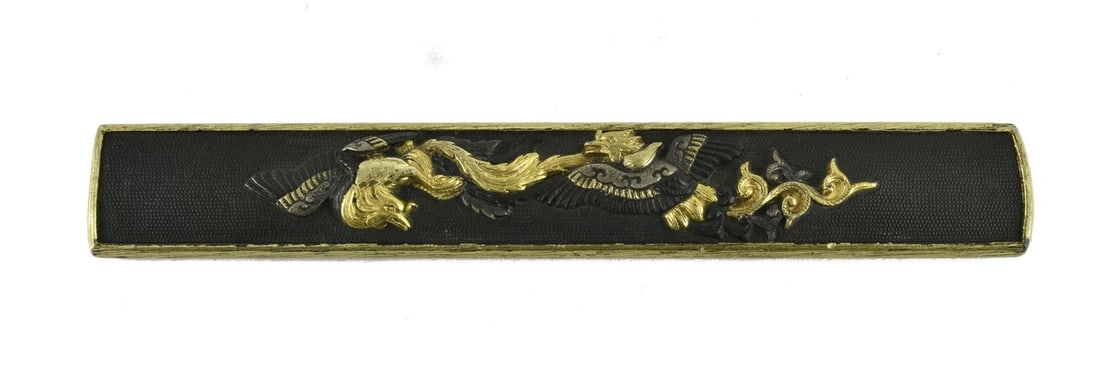 KINKO KODZUKA: Kinko Kodzuka Description: Kinko Kodzuka. Shakudo nanako ground. Design of high-relief phoenix birds in flight with gold, shakudo, and silver highlights. Reverse has gold cat-scratch pattern. Classic