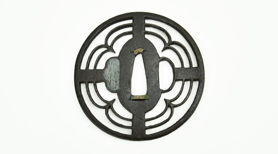 IRON SUKASHI TSUBA LOBES: Iron Sukashi Tsuba Lobes Description: Iron Sukashi Tsuba Lobes. 7 cm, 3”. Size: 7 cm, 3” Accessories: None Accessories Notice: When purchasing pre-owned goods, please refer to the photos